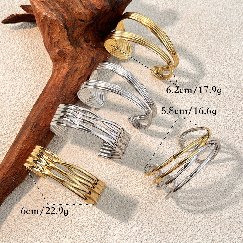 1 Stück unregelmäßig geformtes Manschettenarmband aus Edelstahl in Goldfarbe